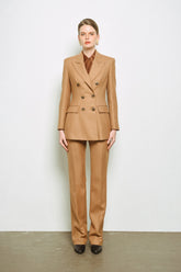 Wool blend double-breasted blazer with peak lapels and tailored waist shaping