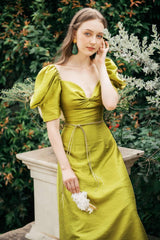 Silk midi dress with puff sleeves, sweetheart neckline, and fitted waist detail