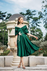 Silk midi dress with draped off-shoulder cape detail and flared A-line skirt