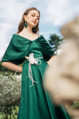 Silk midi dress with draped off-shoulder cape detail and flared A-line skirt