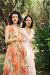 Pleated silk midi dress with ruffle neckline and soft-flowing sleeveless silhouette
