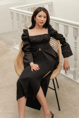 Cotton poplin midi skirt with high waist, straight silhouette, and side slit detail