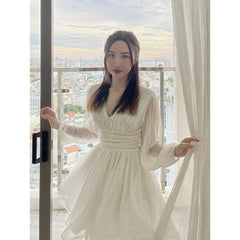 Flowy organza mini dress with long puff sleeves and ruched waist detail