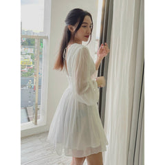 Flowy organza mini dress with long puff sleeves and ruched waist detail