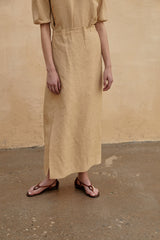 Robe midi minimaliste en lin à manches bouffantes et fente latérale pour une élégance intemporelle par temps chaud