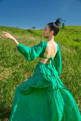 Tiered full-length silk skirt with flowing silhouette and ruched detailing for elegant movement