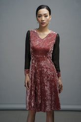 Velvet A-line dress with mesh long sleeves and V-neckline for modern evening styling