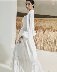 Long sleeve silk midi dress with pintuck bodice, gathered waist, and ruffle hem