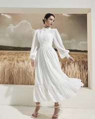 Long sleeve silk midi dress with pintuck bodice, gathered waist, and ruffle hem