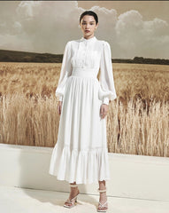 Long sleeve silk midi dress with pintuck bodice, gathered waist, and ruffle hem