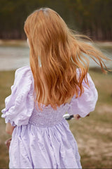 Silk mini dress with puff sleeves and ruched bodice for elegant summer and resort styling