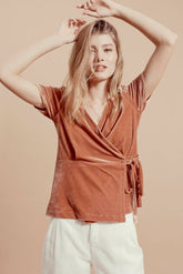 Short-sleeve wrap blouse in soft velvet with tie waist and V-neckline for elegant styling