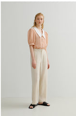 Pantalon large plissé taille haute en lin