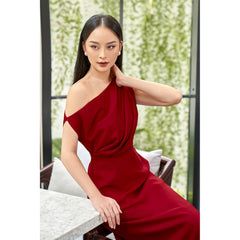 One-shoulder draped midi dress in fluid silk with defined waist and elegant A-line silhouette