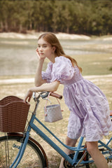 Silk mini dress with puff sleeves and ruched bodice for elegant summer and resort styling
