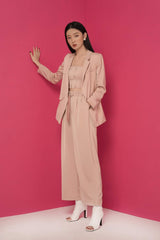 Tailored silk crop top with structured double-breasted button front and sleek minimalist fit