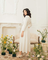 Silk midi dress with sweetheart neckline and long sleeves for romantic and refined elegance