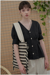 Culotte taille haute en lin avec coupe ample et ourlet court