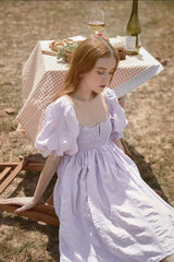 Silk mini dress with puff sleeves and ruched bodice for elegant summer and resort styling
