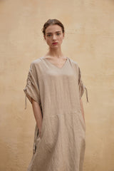 Robe longue en lin coupe décontractée avec col en V, manches ajustables et poches latérales