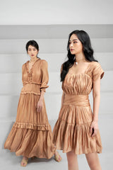 Pleated silk maxi dress with ruffle trim and shirred waist for graceful, full-length elegance