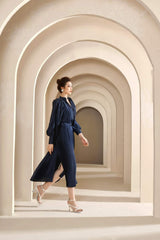 Pleated silk midi dress with belted waist and voluminous long sleeves