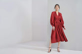 Pleated silk midi dress with long puff sleeves and V-neck wrap silhouette