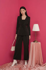 Tailored silk blazer with structured lapel and waist tie detail for modern formalwear