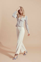 Fitted velvet blouse with gathered front detail and long sleeves for elegant day-to-night wear