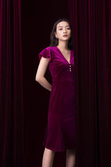 Velvet midi dress with cap sleeves, pearl button detail and flared hem for elegant occasions
