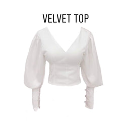 Silk blouse with puff sleeves, V-neckline, and lace-up back detail for elegant styling