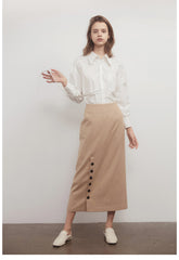 Jupe midi en lin à détails boutonnés et coupe ajustée