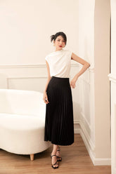 Sleeveless pleated silk top with asymmetric draped neckline and button shoulder detail