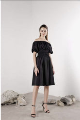 Silk off-shoulder midi dress with ruched bodice and puff sleeves for a feminine silhouette