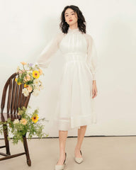 Organza midi dress with high smocked neckline and sheer bishop sleeves for refined elegance
