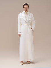 Textured wool-blend full-length coat with tailored notch lapels and adjustable waist tie