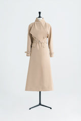 Tailored wool blend trench coat with oversized lapels and structured belted waist