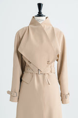 Tailored wool blend trench coat with oversized lapels and structured belted waist