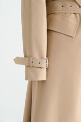 Tailored wool blend trench coat with oversized lapels and structured belted waist