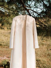Textured wool long coat with tailored silhouette and open front design