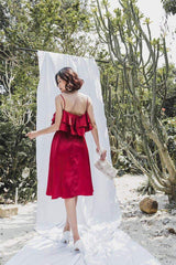 Sleeveless silk midi dress with ruffled bodice and flared hem for summer occasions