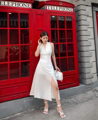 Halter Neck Silk Midi Dress with Front Slit and Back Bow Detail