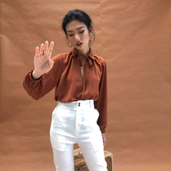 Silk blouse with tie-neck detail and long sleeves for an elegant and polished silhouette