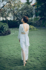 High-waisted midi silk skirt with side slits and sleek tailored silhouette for elevated style