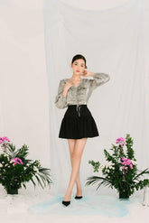 Silk blouse with ruffled neckline and long puff sleeves for elegant day-to-night styling