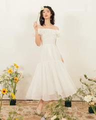 Organza off-shoulder midi dress with tiered hem and ruffle neckline for romantic summer style