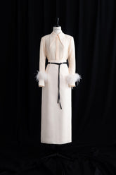 Sheer shirt with structured collar and feather-trimmed cuffs for elegant statement styling