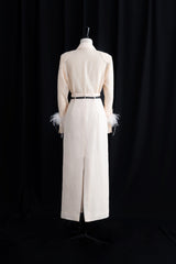 Textured wool-blend midi skirt with high waist and tailored silhouette for refined style