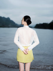 High-Waisted Mini Skirt in Structured Twill with Draped Side Detail