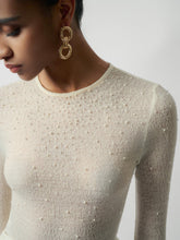 Sheer embellished evening dress with long sleeves and delicate pearl accents